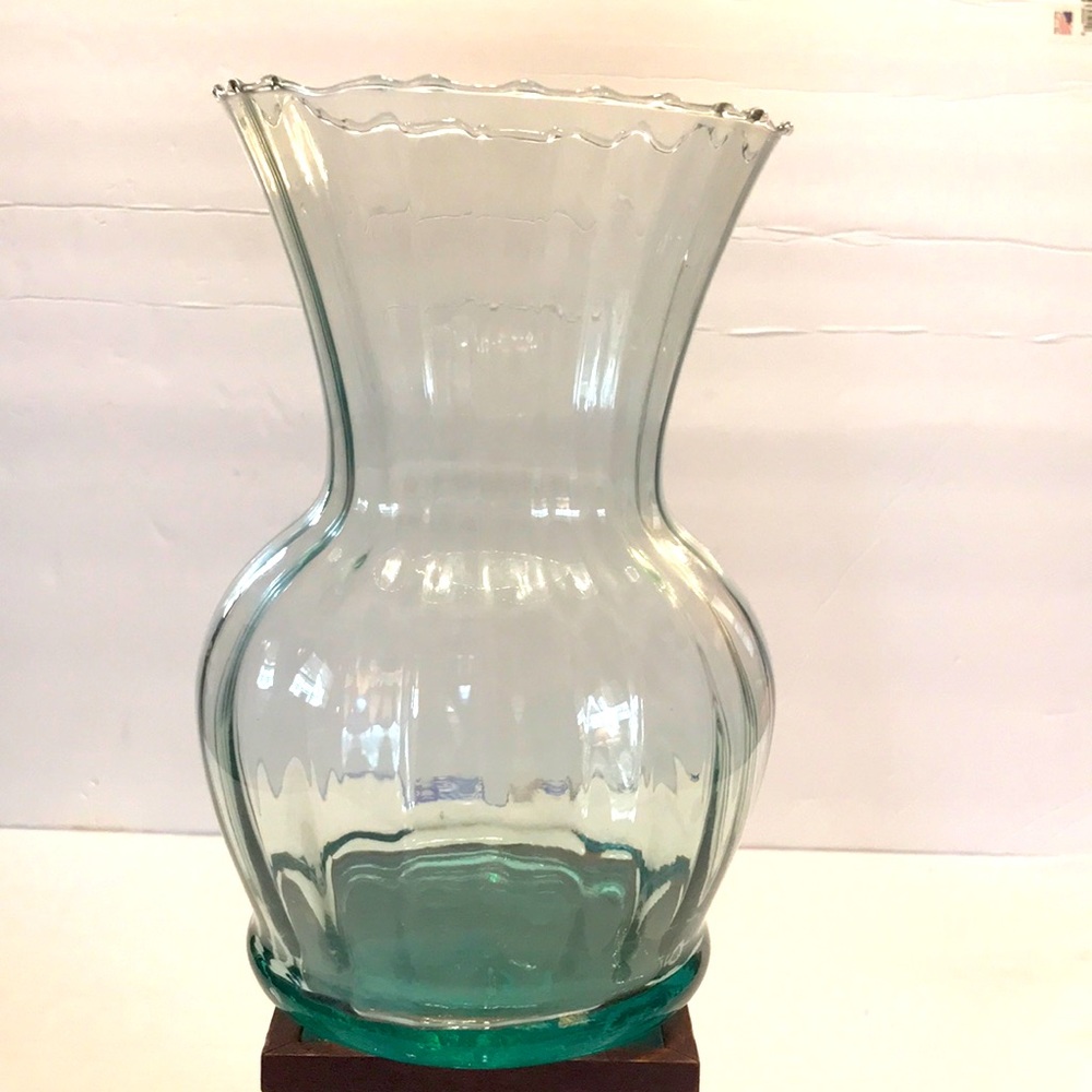 Hand blowed 9” glass vase fluting with flared 51/4” opening.